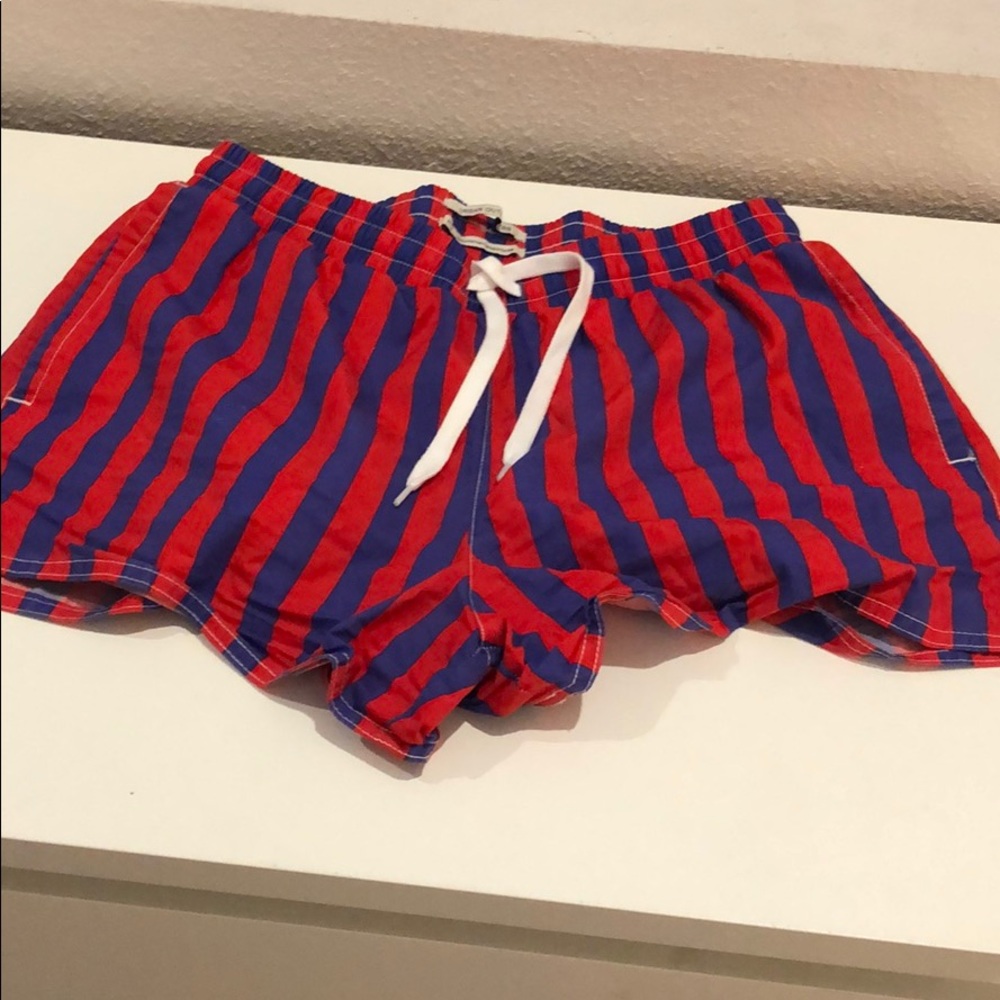 Blue and red striped beach shorts